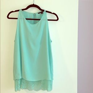 Sleeveless top with lace bottom